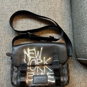 Coach x Jean Michel Basquiat design collection bag. Black with design